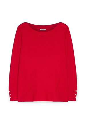 Suéter de punto rojo de manga larga con escote redondo y tres pequeños botones blancos en cada muñeca.