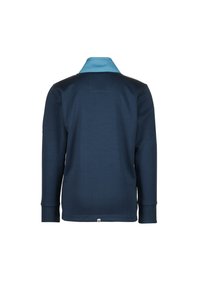 Polo a maniche lunghe blu navy con colletto azzurro. Tessuto morbido e liscio con una vestibilità rilassata. Dettaglio di cucitura sottile sul retro.