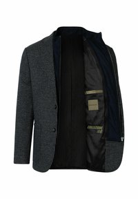Gepersonaliseerde donkerblauwe colbert met ruitpatroon, voorzien van twee knopen, gekartelde revers en een contrasterende zwarte binnenkant met een label "COLLEZIONE #4."