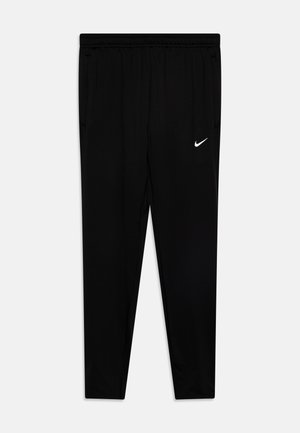 Pantalons de sport noirs en tissu lisse et léger. Taille élastique avec cordon de serrage, poches latérales et petit logo blanc sur le côté gauche.
