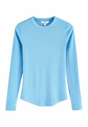 Himmelblaues Langarmshirt aus geripptem Stoff. Besitzt einen runden Halsausschnitt und einen geraden Schnitt mit einer leichten Kurve am Saum.