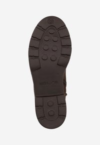 Brown rubber sole with a textured surface, featuring circular patterns and a logo. Marked with size 37. Designed for durability.