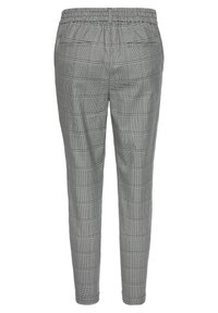 Grijze geruite broek met een elastische tailleband, tapse enkels en twee achterzakken. De stof heeft een gestructureerd geweven patroon.