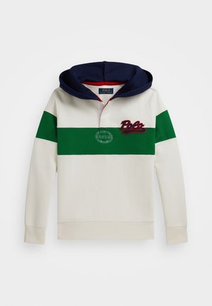 Pullover hettegenser i krem, marineblå og grønn. Har en to-knappslukking, brodert logo og globemønster. Myk tekstur, avslappet passform.