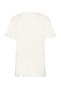 T-shirt blanc à manches courtes en coton doux. Design classique à col rond avec une texture lisse et sans logos ni graphiques visibles.