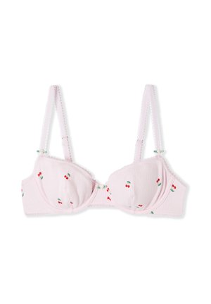 Soutien-gorge rembourré rose clair avec petits imprimés de cerises rouges, bretelles dentelées réglables et petit nœud blanc au centre avant.
