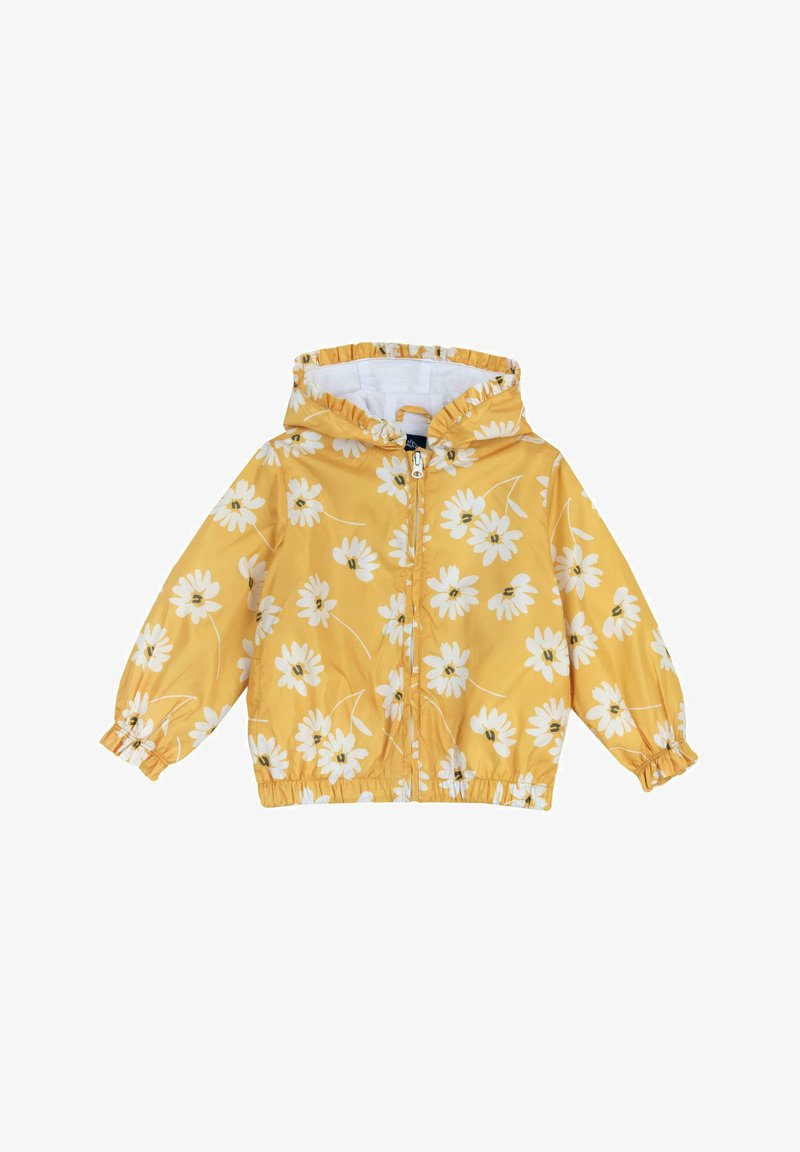 Giacca leggera con cappuccio giallo, caratterizzata da una stampa floreale con margherite bianche. Maniche elastiche e design con zip frontale.