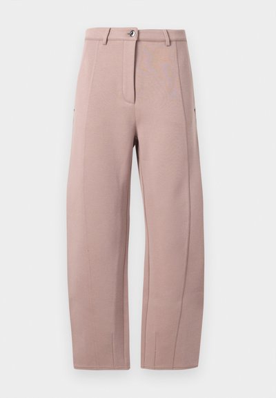 Pants in soft, light pink fabric with a straight cut, featuring a front zipper, a button closure, and side pockets. Smooth texture with seam details.