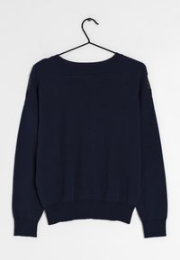 Dunkelblauem Sweatshirt mit Rundhals, überschnittenen Schultern und geripptem Saum. Verfügt über Spitzenverzierungen an den Ärmeln, eine glatte Textur und eine lockere Passform.