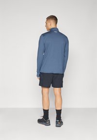 Under Armour TRAIL RUN SHORTS - Športové šortky - black/reflective