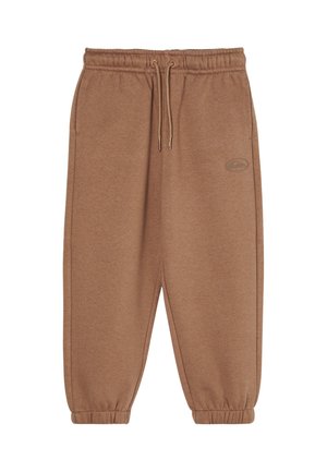 Braune Sweatpants mit elastischem Bund, Kordelzug, Seitentaschen, elastischen Bündchen und kleinem Logo am rechten Oberschenkel.