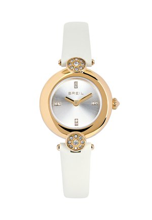 Orologio rotondo oro con cinturino bianco, dettagli in cristallo sulla lunetta e sul quadrante, lancette dorate che segnano le 10:10, nome del marchio Breil sul quadrante argentato.