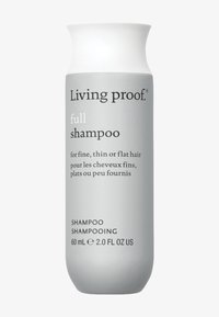 Grijze fles met Living Proof shampoo, met een taps toelopende vorm en witte dop; gelabeld voor fijn, dun of plat haar; 60 ml.
