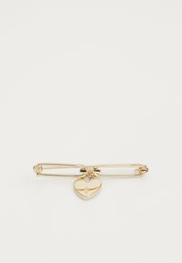 Gold-tone safety pin brooch featuring a heart-shaped charm with a smooth surface and a small gemstone accent for added detail.