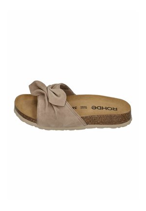 Beige suede slide sandal with a large fabric bow on top, cork midsole, and cushioned footbed labeled "Rohde."