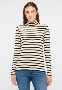 Schwarz-weiß gestreifter Rollkragenpullover mit figurbetontem Schnitt und gerippter Struktur. Die langen Ärmel enden am Handgelenk.