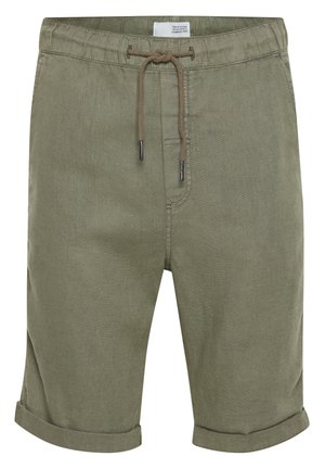 Oliwkowe szorty z elastycznym pasem, z wywiniętymi nogawkami i gładkim, lekkim materiałem. Posiadają przeszywane kieszenie i prosty design.
