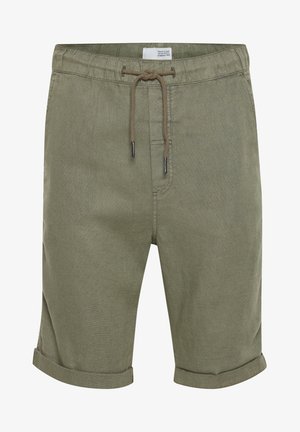 Oliivrohelised lühikesed püksid, millel on nööriga vöökoht, keeratud servad ja sile, kerge kangas. Omab õmmeldud taskuid ja lihtsat disaini.