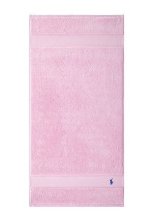 Light pink rectangular towel with textured bands at top and bottom and small blue polo player logo near bottom edge.