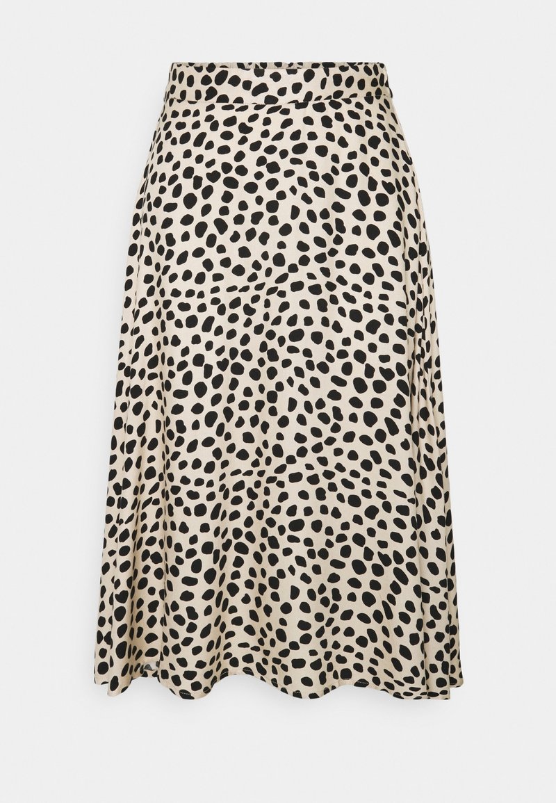 Jupe midi beige avec motif de pois noirs irréguliers et ourlet légèrement évasé.