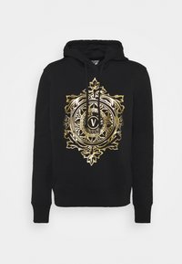 Felpa nera con cappuccio caratterizzata da un'importante grafica ornamentale in oro e bianco sul davanti, completata da un cappuccio con lacci.