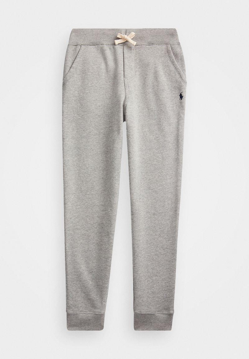 Pantalons de survêtement gris en tissu doux, avec une taille à cordon de serrage, deux poches latérales et des poignets côtelés. Détail du logo sur la jambe.