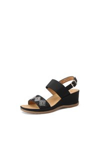 Sandalo con tacco nero caratterizzato da cinghie in tessuto texturizzato, un'arricciatura decorativa sul davanti e una fibbia ankle sicura.