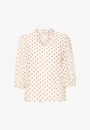 Heled roosa pluus mustade täpitega, V-kujulise kaelusega ja puffsevarrukatega. Valmistatud tekstuuriga kangast, millel on kaelas õrnad ripsmedetailid.