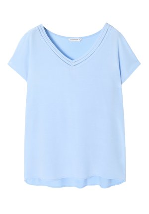Light blue short-sleeve top with a V-neckline, featuring double stitched accents around the neckline and a soft, smooth texture.