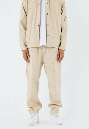 Pantalones deportivos - beige