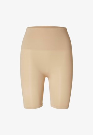 Pantalones cortos de tejido elástico beige con una cinturilla alta y textura suave, diseñados para ofrecer comodidad y una silueta ajustada.