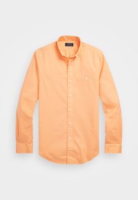 Orange knäppskjorta i bomullstyg, med spetsig krage, långa ärmar och en liten broderad logotyp på bröstet.