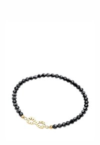 Schwarzes Perlenarmband mit facettierten Perlen und einem goldenen Unendlichkeitssymbol in der Mitte, das eine glatte Textur und ein minimalistisches Design präsentiert.
