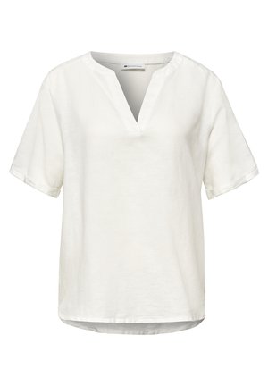 Blouse blanche à manches courtes avec un col en V fendu et un ourlet légèrement arrondi, réalisée en tissu léger.