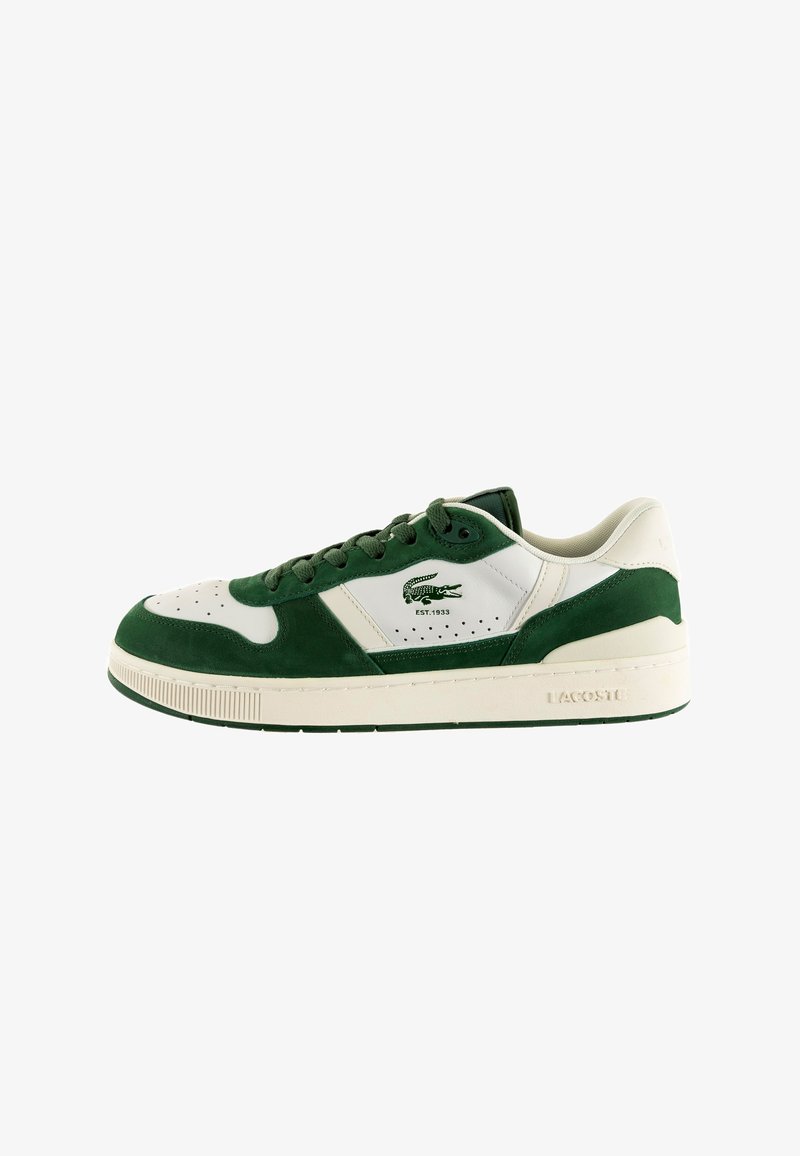 Sneaker verde e bianco realizzata in pelle e camoscio, con dettagli perforati, chiusura con lacci e suola testurizzata con branding sul lato.