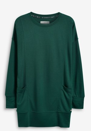 Sweat-shirt tunique à manches longues vert foncé avec col rond, deux poches avant et coupe décontractée.