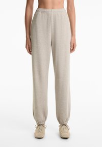 OYSHO RELAXED FIT - Donji dijelovi trenirke - beige