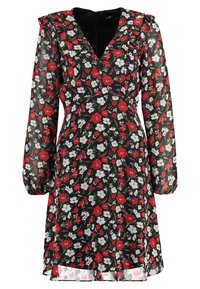 Blommig klänning i genomskinligt svart tyg med röda och vita blommor, långa ärmar med elastiska manschetter och V-ringning.