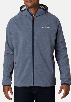 Giacca blu con cappuccio, chiusura frontale con zip, polsini elasticizzati e due tasche laterali. Presenta il logo sul petto, una zip a contrasto in navy e dettagli rossi.