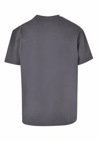Grå kortærmet t-shirt med rund hals. Glat tekstur og afslappet pasform. Minimalistisk design uden mønstre eller accenter. Ensfarvet bagside.