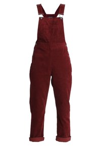 Burgundy kordflodsoveraller med justerbara axelremmar, framficka, sidoknappar och uppvikt byxben.