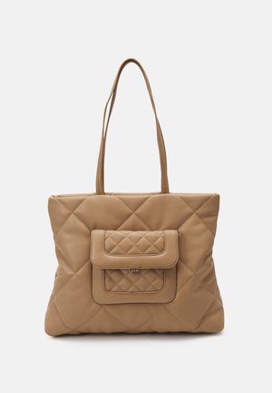 Beige quilted leather tote bag with long shoulder straps and a front flap pocket with diamond stitching and metal logo plate.