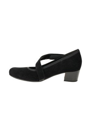 Black suede Mary Jane shoe with low block heel and wide strap across instep, angled right on white background.