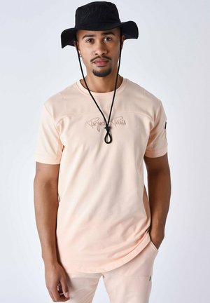 TECHNIQUE À DÉCOUPES - Camiseta estampada - pale peach