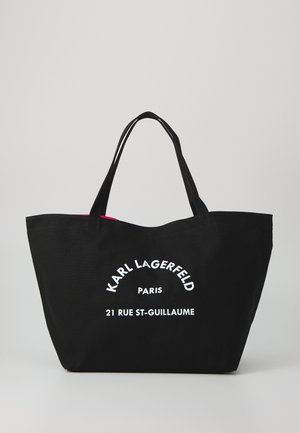 Saco de algodão preto com alças duplas, apresentando o logótipo em texto branco "KARL LAGERFELD PARIS" e "21 RUE ST-GUILLAUME" na frente.