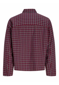 Chemise à manches longues à carreaux rouges et bleu foncé vue de dos, avec un ourlet droit et un col classique.