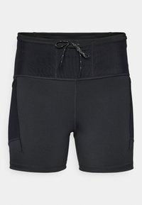  svarte idrettsshorts med høy midje, strukturert øverste panel og snøring. Har flatlocksøm og sidelommer.
