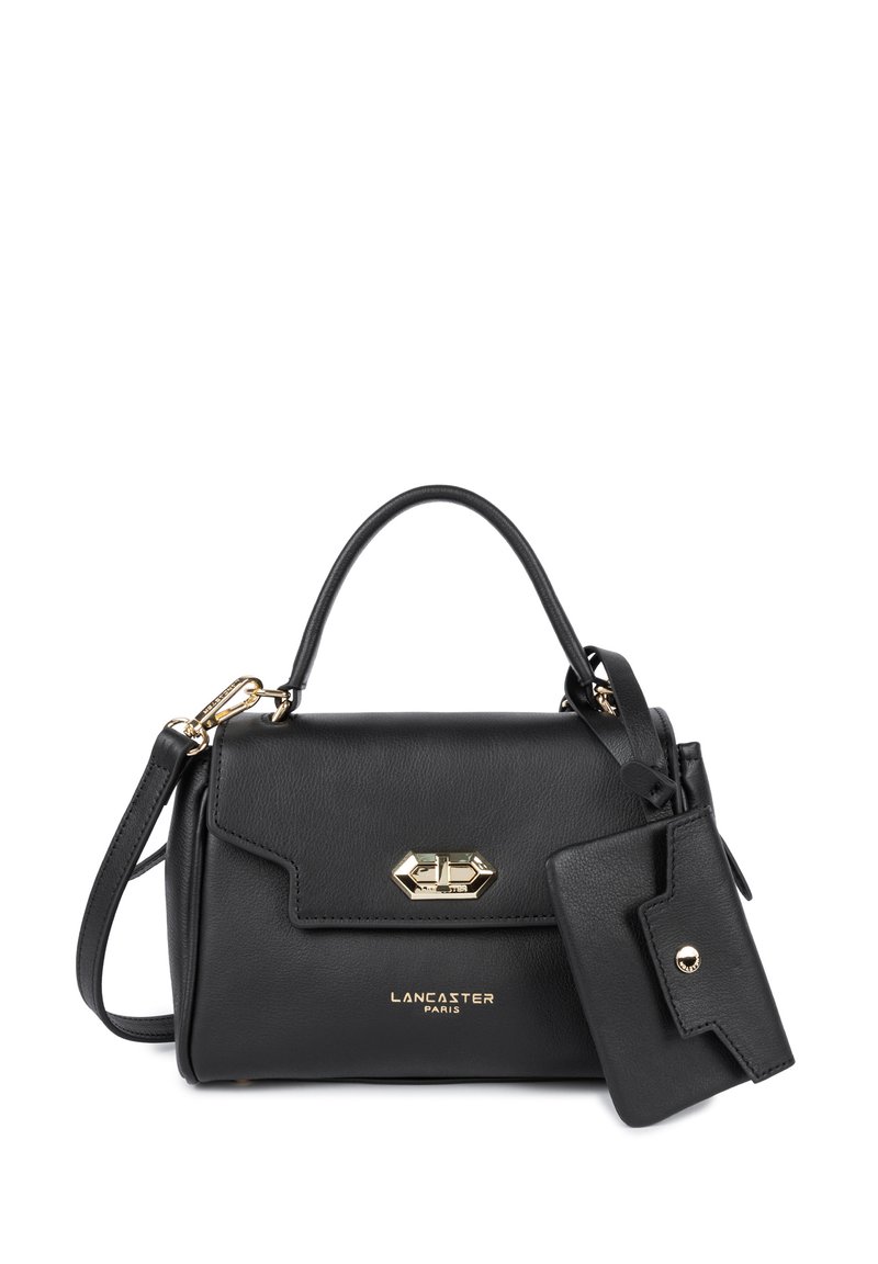 Borsa a mano in pelle nera con una forma strutturata, accessori in dorato e un'etichetta rimovibile. Dotata di manico superiore e tracolla regolabile.