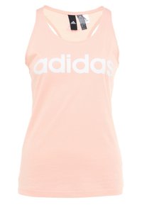 Top de tirantes rosa claro, hecho de una tela suave, con un escote amplio y un gran logo blanco de "adidas" en el frente. Diseño de espalda con tirantes.