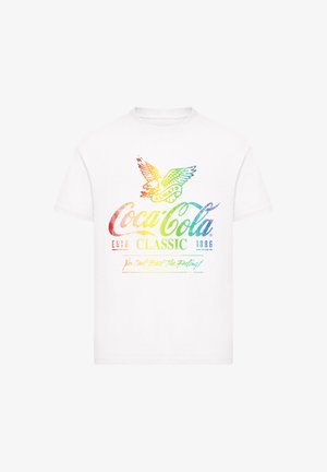 White T-shirt with a rainbow-colored vintage Coca-Cola Classic logo, eagle graphic with "Always," and slogan "You Can't Beat The Feeling!"